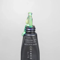 Cosmedix Eye Doctor tube tip with shimmering eye treatment gel emerging