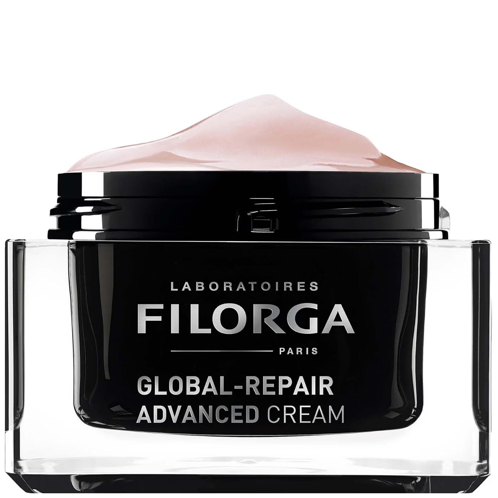 Filorga Global-Repair Advanced Cream open black jar with pink anti-aging cream on white background