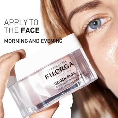Filorga Oxygen-Glow radiance cream held by woman apply to face morning and evening