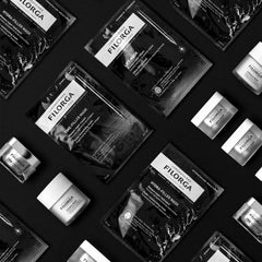 Filorga skincare mask collection flatlay featuring Lift-Mask Time-Filler Hydra-Filler Scrub and Meso-Mask products