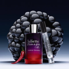 Juliette Has a Gun Purple Trouble travel spray and box with blackberries and red chili pepper