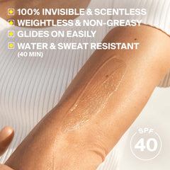 Sunscreen swatch on arm showing invisible scentless weightless and water resistant formula