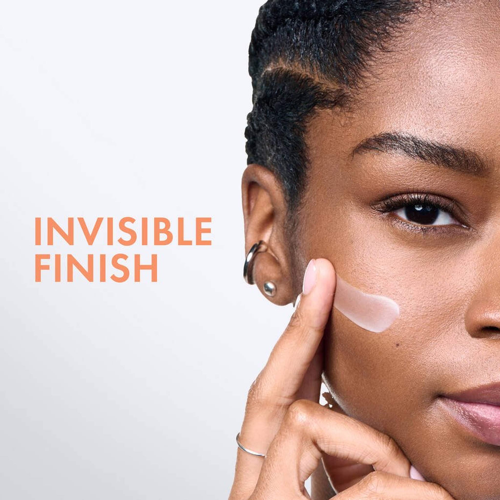 Vichy Capital Soleil UV-Age Daily SPF 60 sunscreen with invisible finish applied to skin