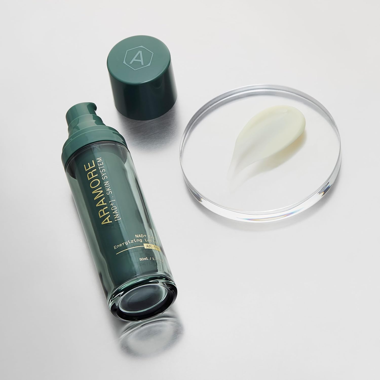 Aramore skincare product with a white disc on a light gray background