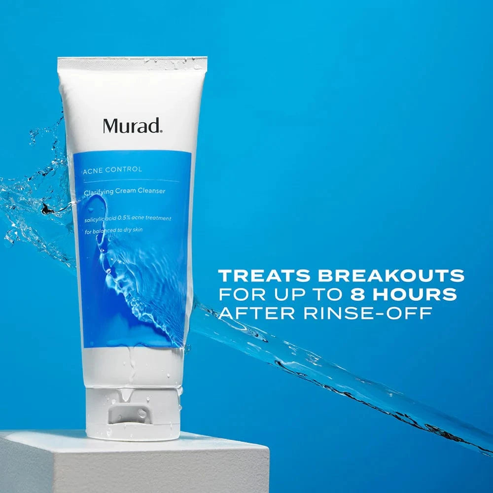 Tube of Murad Acne Control Cream Cleanser with water splashes on a blue background