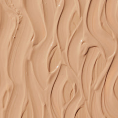 Close-up of beige cream with wavy patterns
