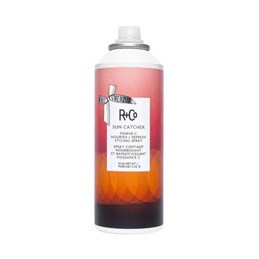 R+Co Sun Catcher hair spray bottle on a white background