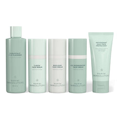 Set of skincare products from Marini Skinsolutions on a white background