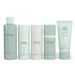 Set of skincare products from Marini Skinsolutions on a white background