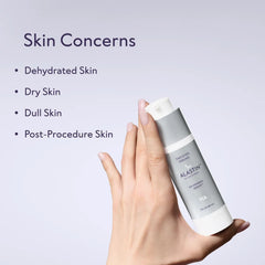 Hand holding ALASTIN HA Immerse Serum for dehydrated dry dull and post-procedure skin