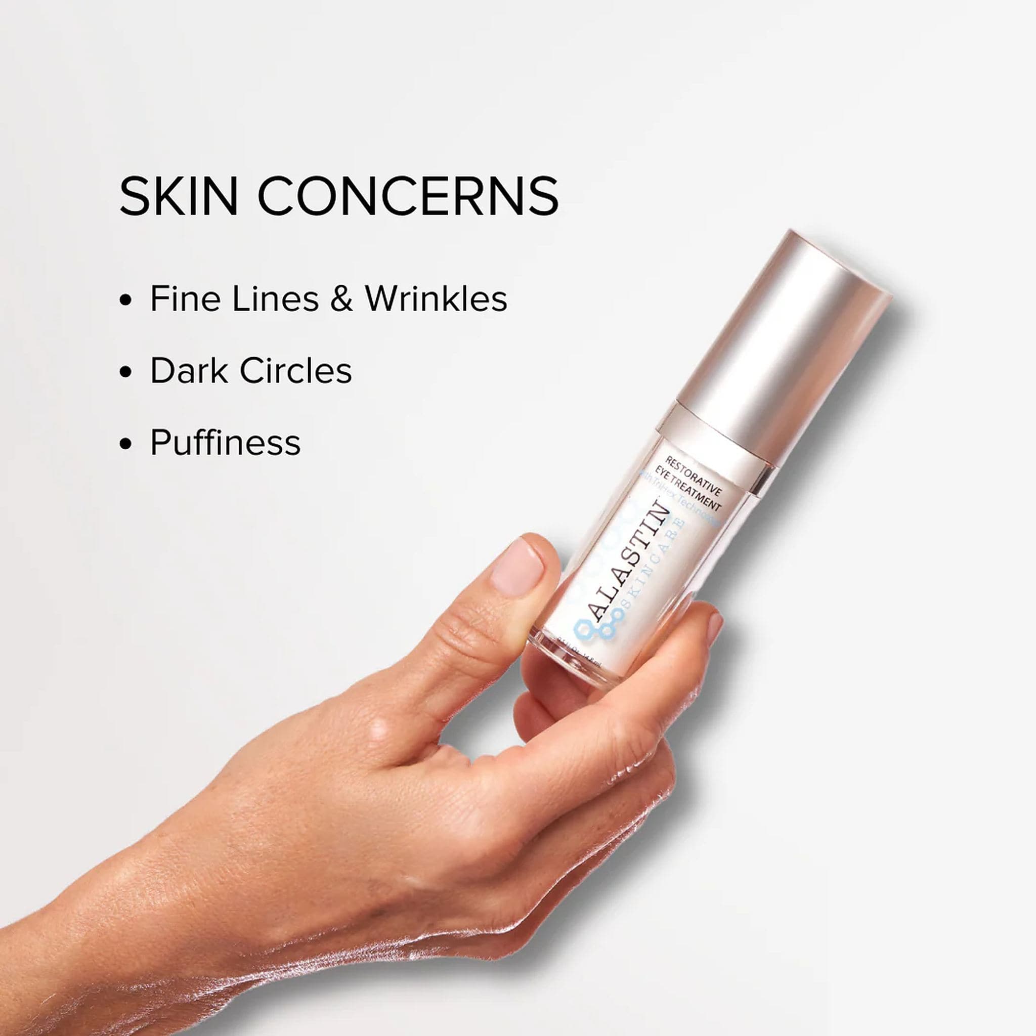Hand holding ALASTIN Restorative Eye Treatment that targets fine lines and wrinkles plus dark circles and puffiness