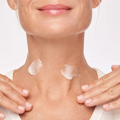 ALASTIN Restorative Neck Complex neck cream applied to the front of a woman's neck