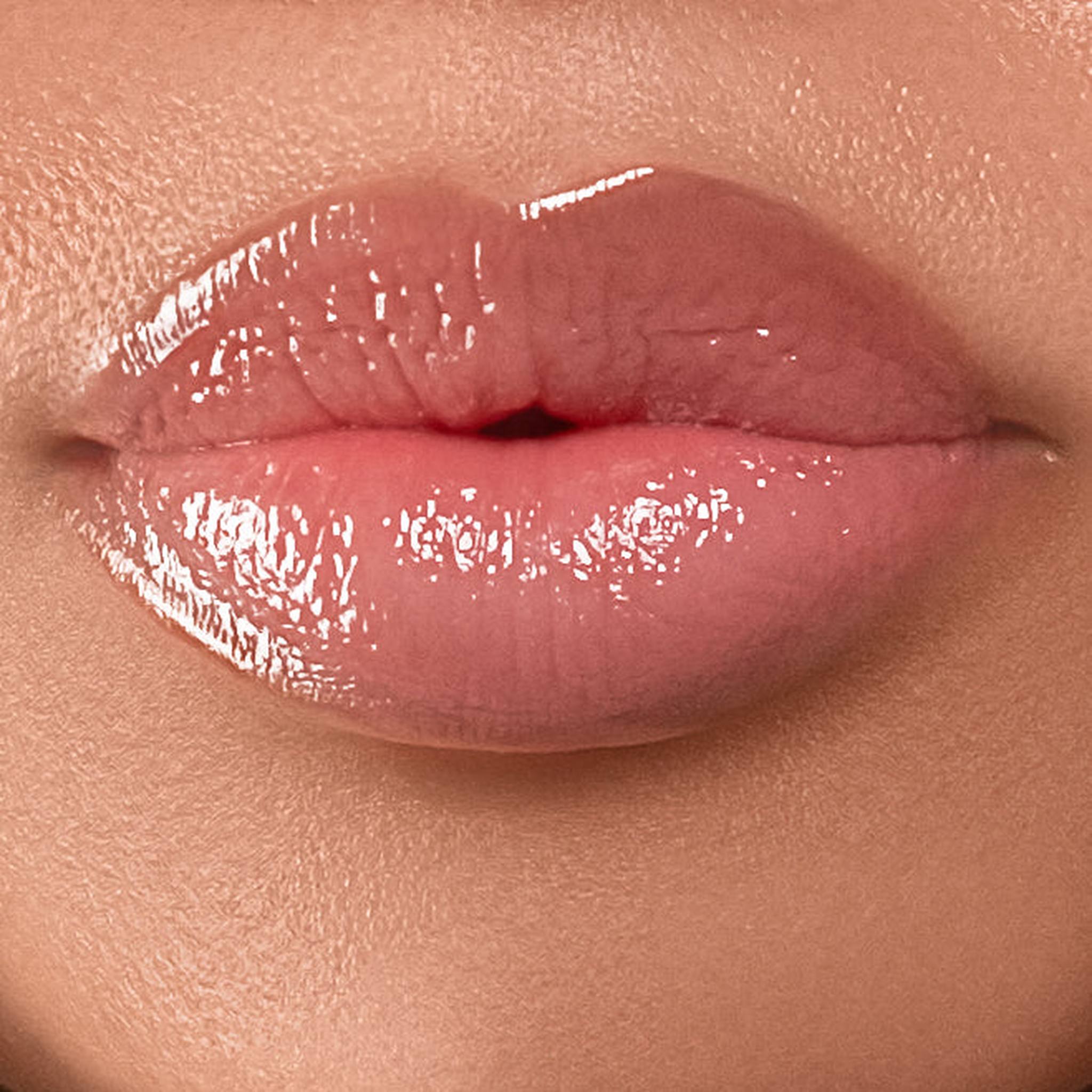 Closeup of full glossy nude lips wearing Anfisa Skin AN-Gloss Ceramide Lip Treatment Original 4