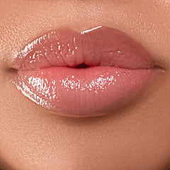 Closeup of full glossy nude lips wearing Anfisa Skin AN-Gloss Ceramide Lip Treatment Original 4
