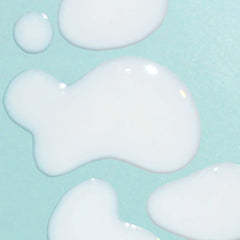Bask mineral sunscreen serum SPF 30 lightweight serum texture drops and swatches on teal background