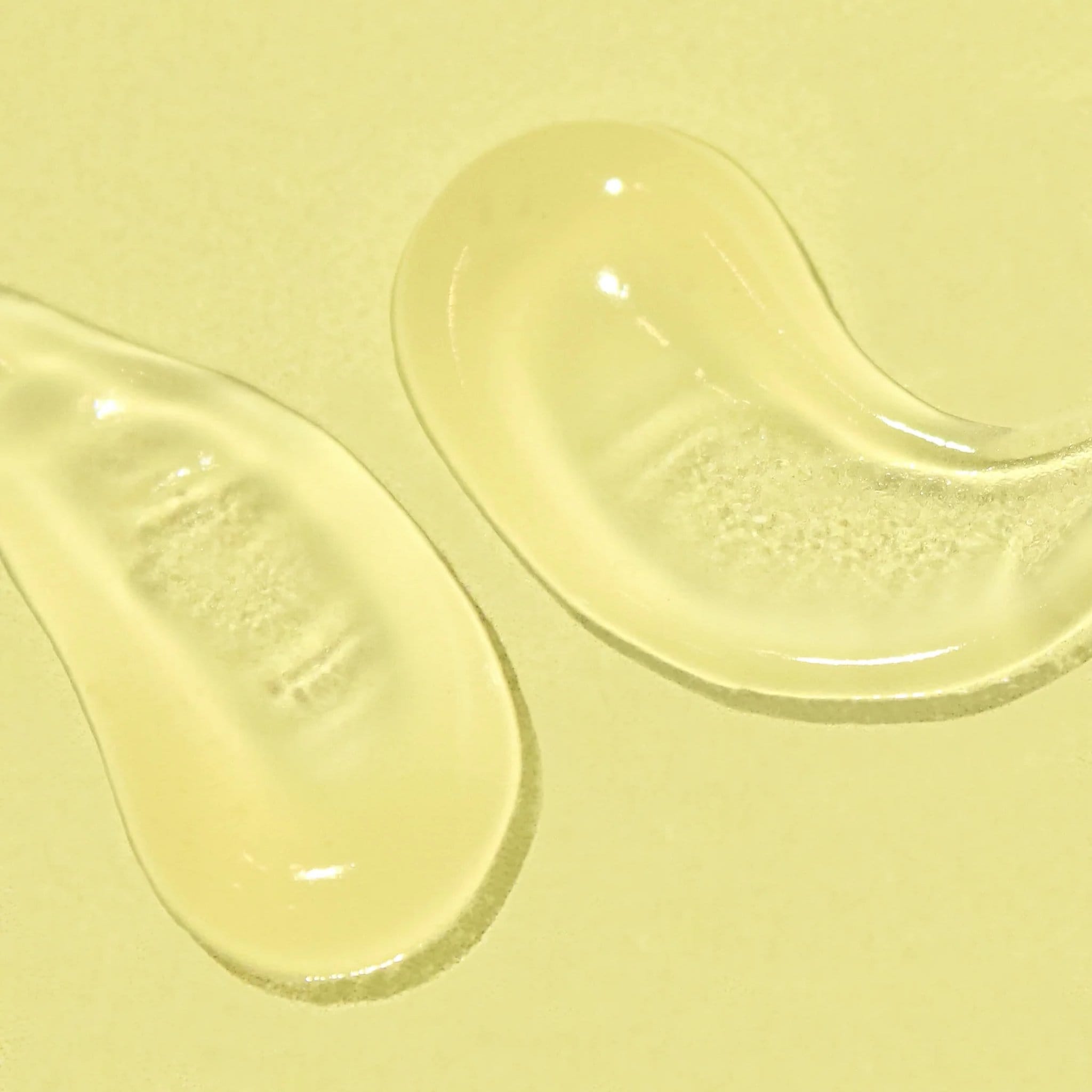 Bask SPF 40 daily invisible gel sunscreen clear lightweight gel texture swatches on yellow background