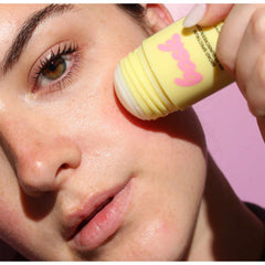 Bask SPF 50 sunscreen stick applied under eye area on face demonstrating targeted skin sun protection