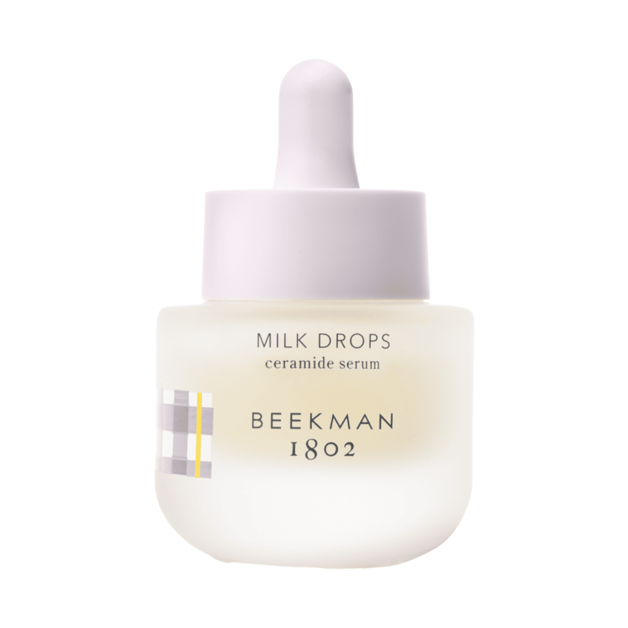 Beekman 1802 mini Milk Drops ceramide serum bottle with dropper on white background