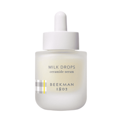 Beekman 1802 Milk Drops ceramide serum bottle with dropper on white background