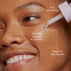 Dropper applying Milk Drops serum to under eye area for instant plumping hydration