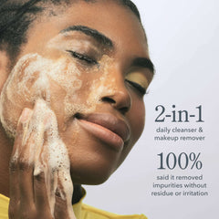 Woman washing face with Milk Froth foam as a 2-in-1 daily cleanser and makeup remover