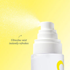 Close-up of ultra-fine mist spraying from body mist nozzle