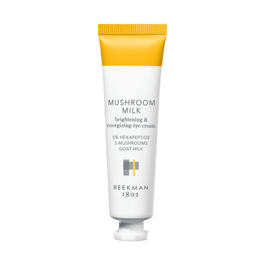 Beekman 1802 Mushroom Milk brightening and energizing eye cream tube on white background