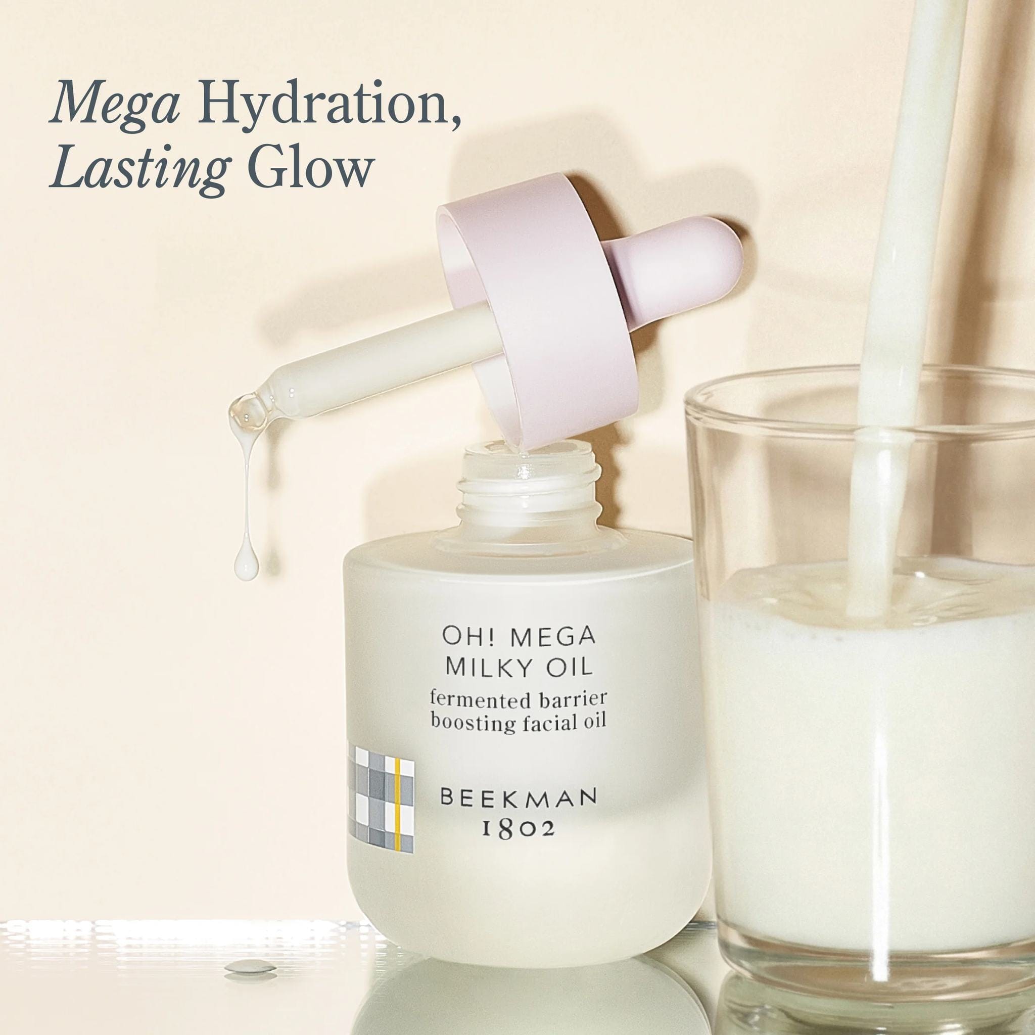 Oh Mega Milky Oil dropper pouring into a glass of milk for mega hydration and lasting glow