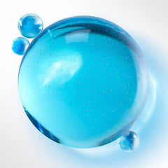 Bioderma Atoderm Gel Douche clear blue cleansing gel texture swatch with tiny air bubbles