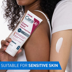 Woman holding CeraVe Eczema Relief Moisturizing Cream to shoulder with cream swatch on arm for sensitive skin