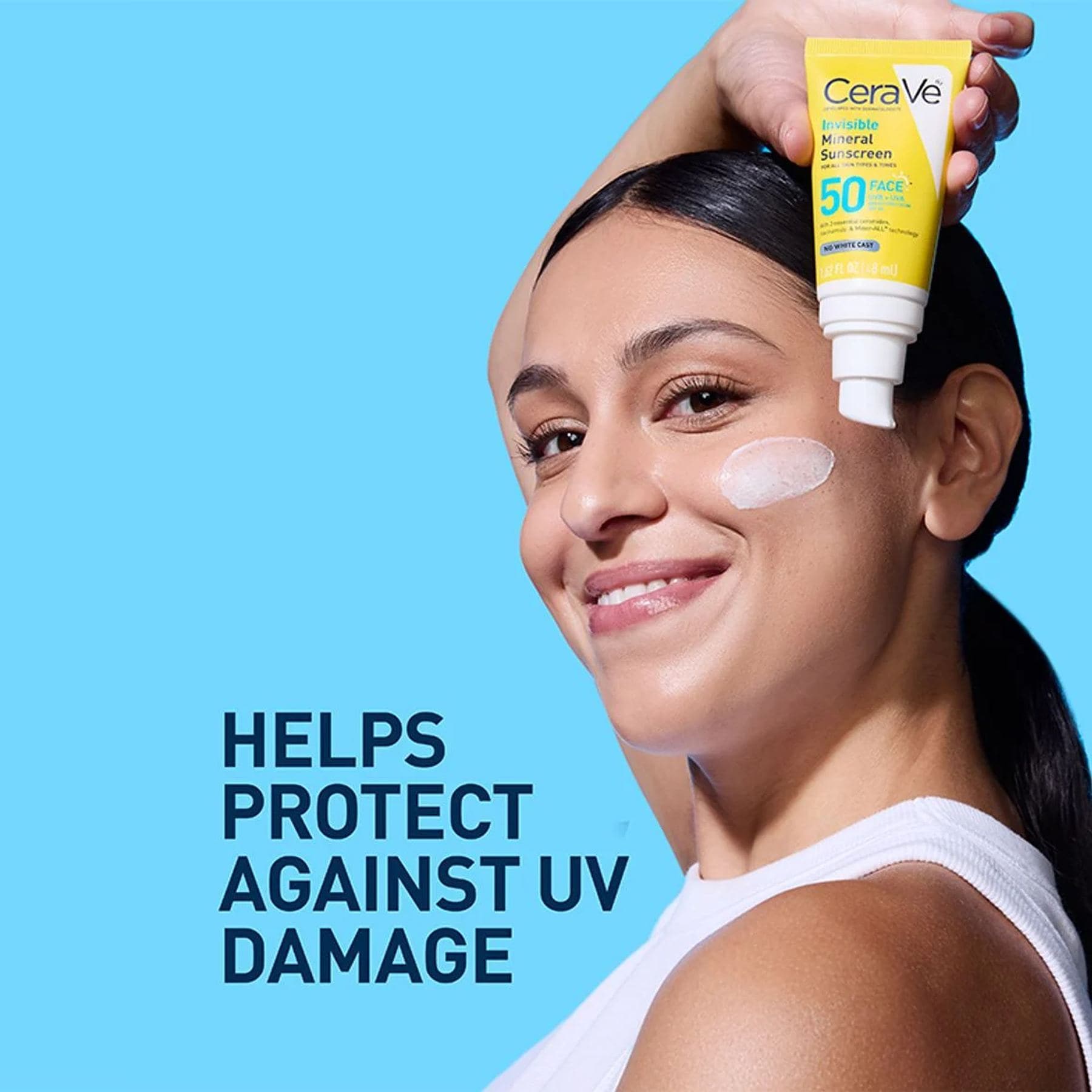 Woman applying CeraVe SPF 50 mineral face sunscreen to cheek for broad spectrum protection against UV damage