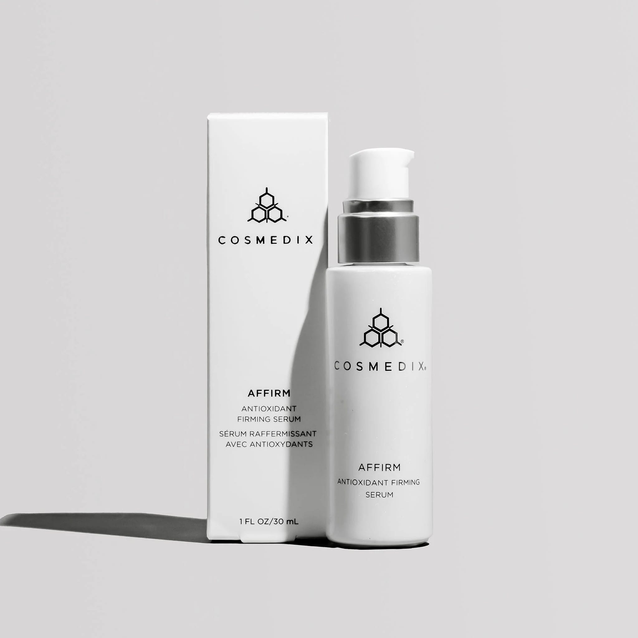 Cosmedix Affirm antioxidant firming serum bottle displayed with its packaging box