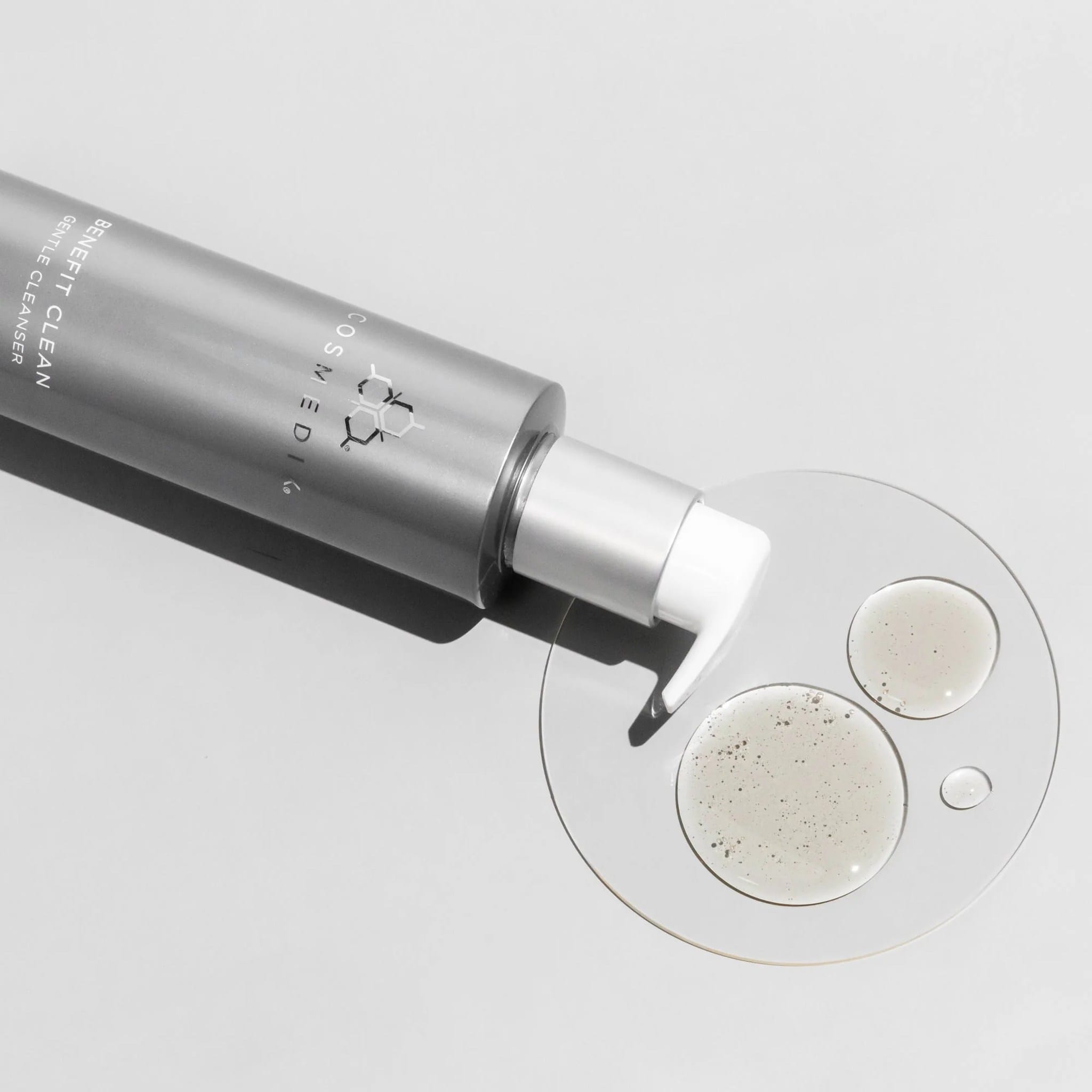 Cosmedix Benefit Clean cleanser texture swatch shown beside its bottle