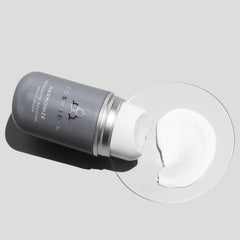 Cosmedix Harmonize moisturizer cream texture shown beside its bottle