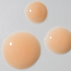 Cosmedix Revert boosting brightening serum texture droplets close-up