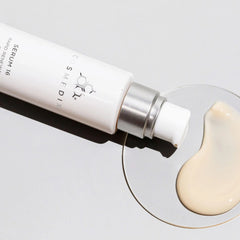 Cosmedix Serum 16 rapid renewal serum texture beside its tube