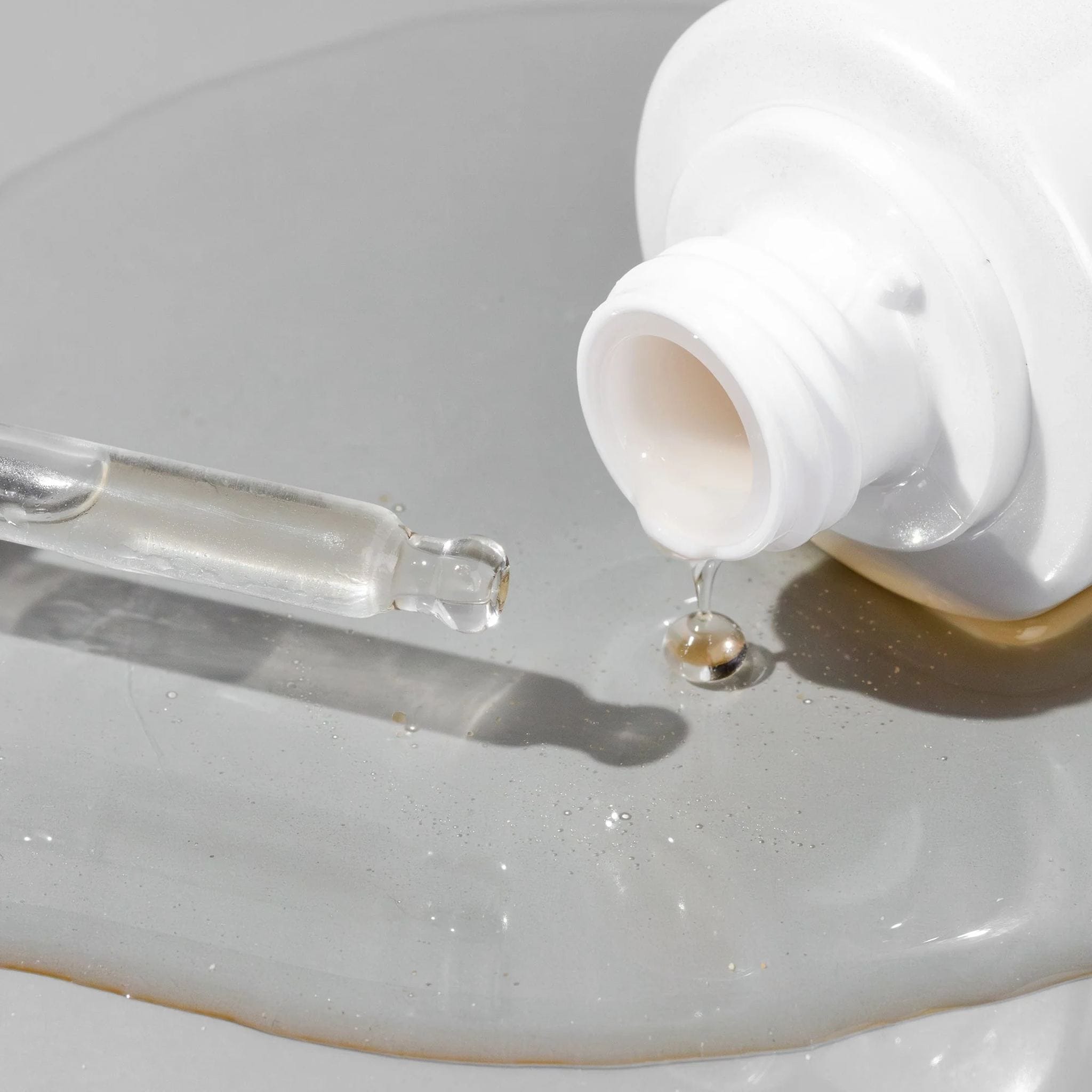 Cosmedix Surge hyaluronic acid booster dropper dispensing serum droplet