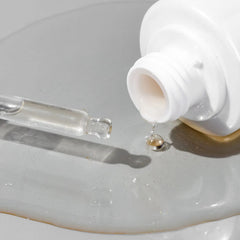 Cosmedix Surge hyaluronic acid booster dropper dispensing serum droplet