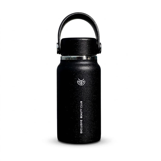 Exclusive Beauty Club On-The-Go Micro Bottle in black with carry handle front view