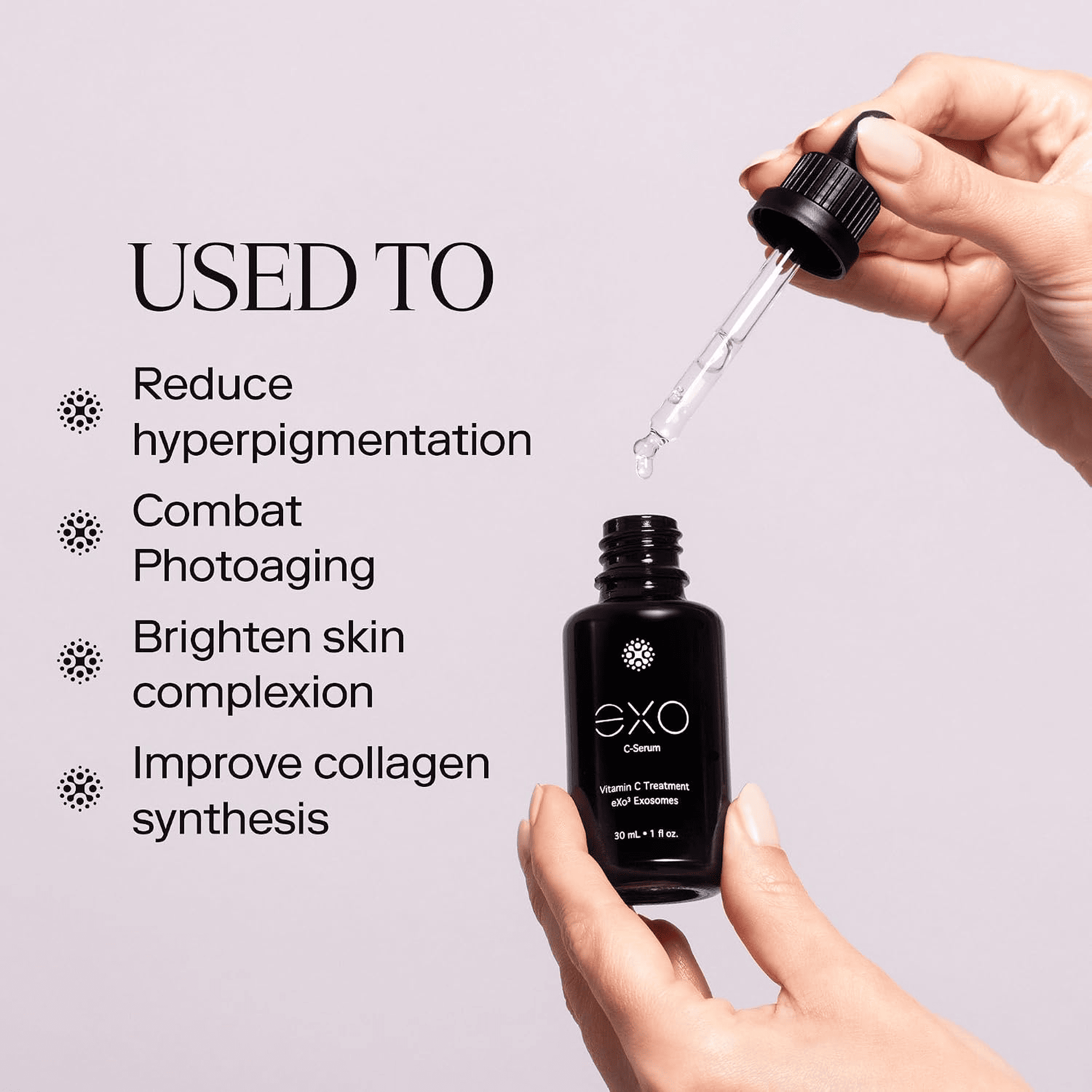 Hand holding Exo C-Serum dropper bottle showing vitamin C serum benefits