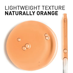 Filorga Hydra-AOX 5 lightweight naturally orange serum texture swatch and dropper on white background