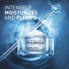 Filorga Hydra-Hyal cream open jar with hyaluronic acid serum syringe intensely moisturizes and plumps skin