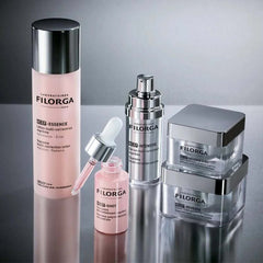 Filorga full NCEF skincare range including NCEF-Shot NCEF-Intensive NCEF-Essence NCEF-Reverse and NCEF-Reverse Eyes on reflective surface