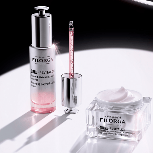 Filorga skincare products including a serum, eye cream, and face cream on a white background.