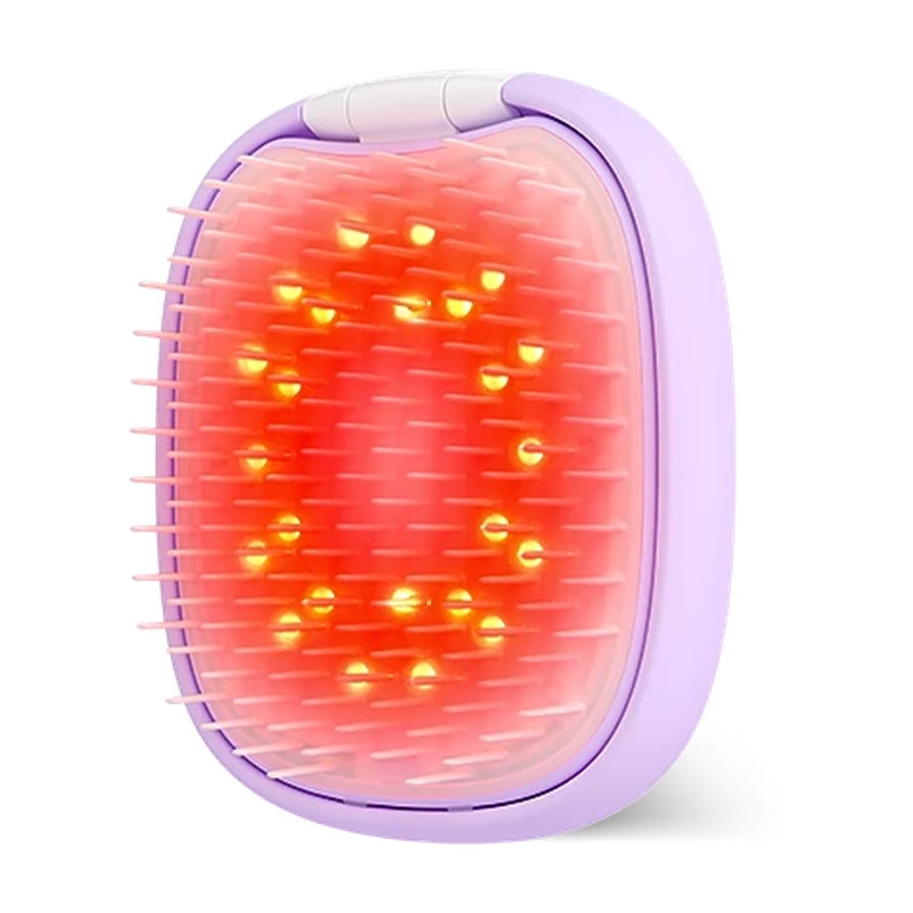FOREO FLIP plus LED detangling hair brush in lavender glowing with red light through flexible bristles