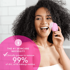 Woman using Foreo Luna 4 play pink brush to cleanse her face 5