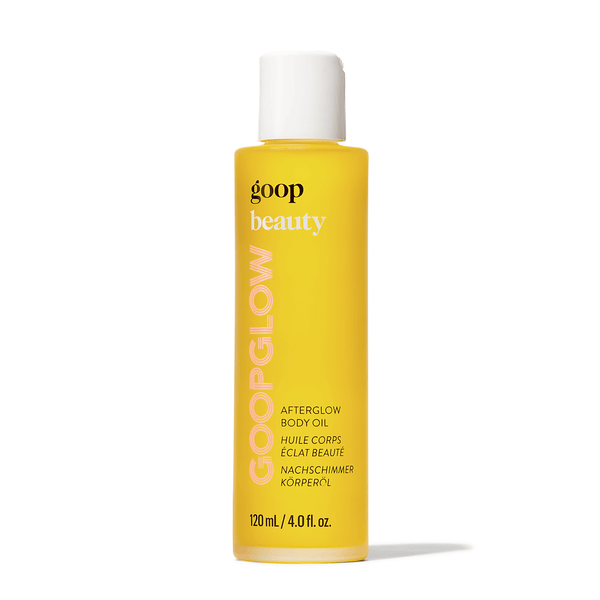 goop Beauty Afterglow Body Oil nourishing body oil with sea buckthorn, raspberry seed oil, and squalane for hydrated glowing skin. Available at Exclusive Beauty Club.