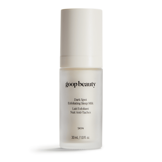 goop Beauty Dark Spot Exfoliating Sleep Milk overnight exfoliating serum with glycolic and lactic acids to smooth texture and fade dark spots. Available at Exclusive Beauty Club.