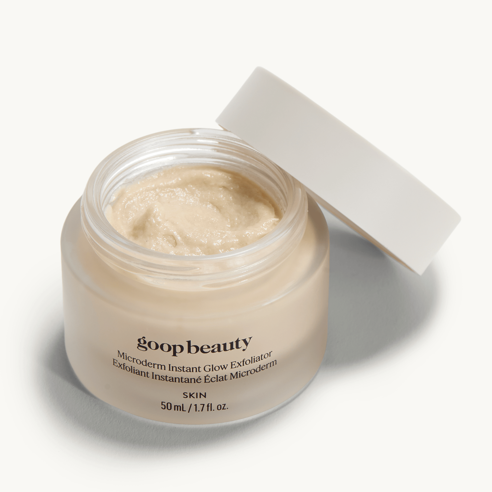 goop Beauty Microderm Instant Glow Exfoliator dual-action exfoliating face scrub with mineral micro-exfoliants and glycolic acid for smoother, brighter skin. Available at Exclusive Beauty Club.
