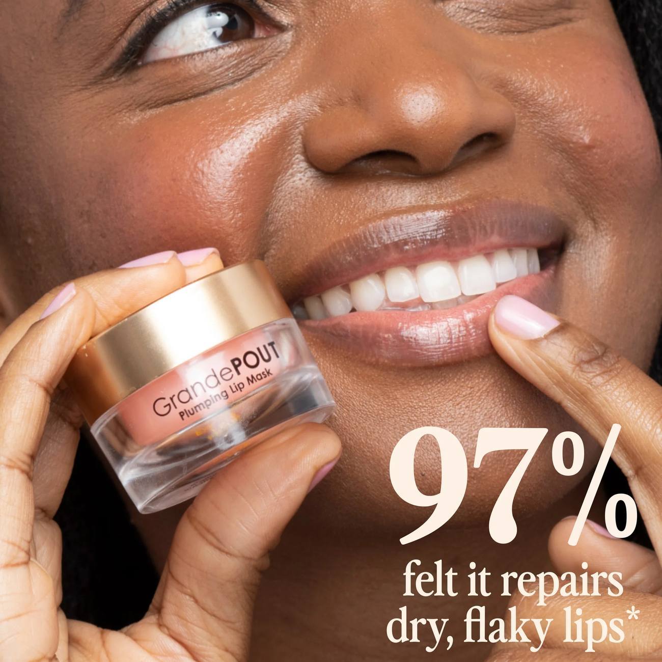 Woman applying GrandePOUT Plumping Lip Mask with 97% dry flaky lip repair statistic